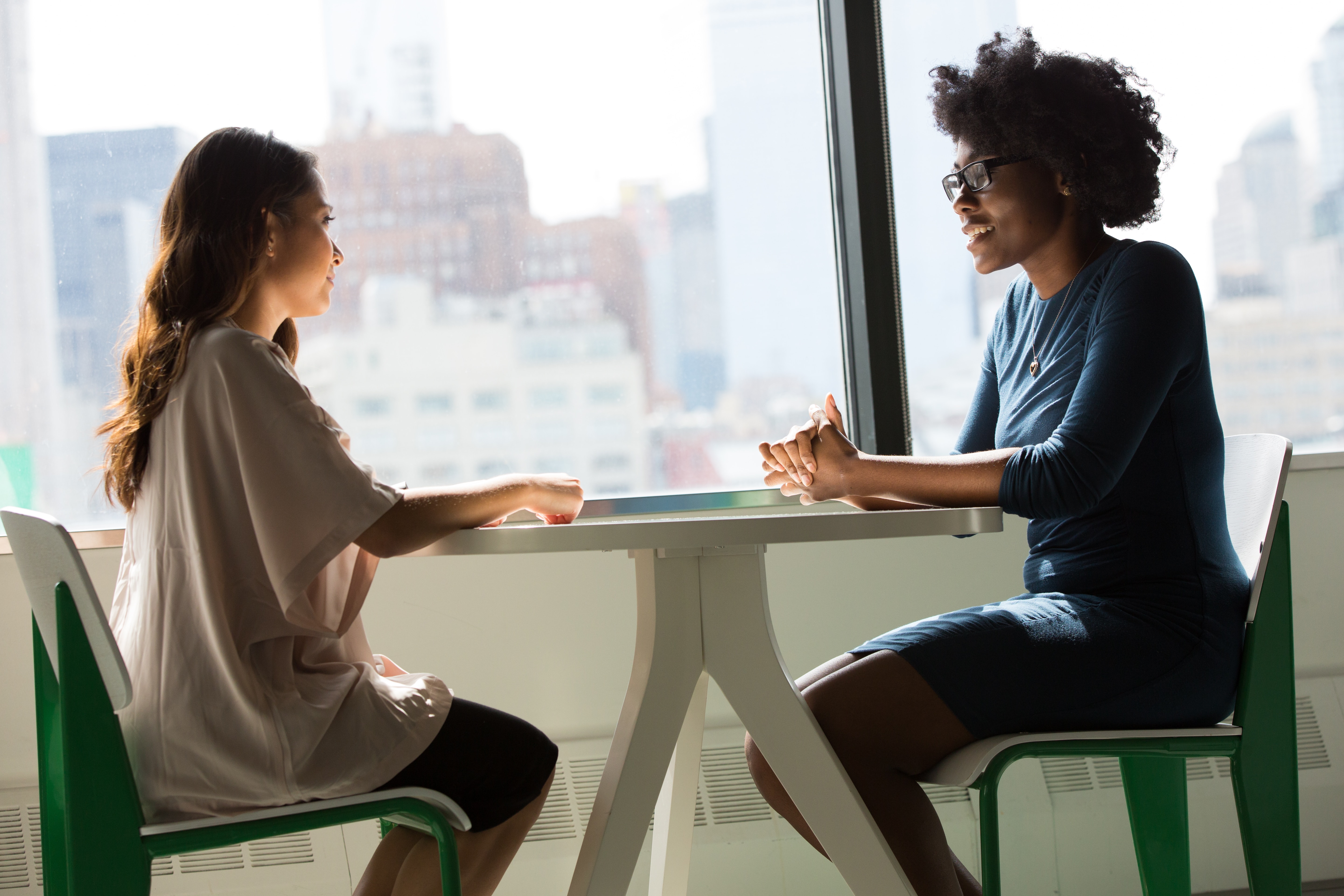 Two women talking (Christina@wocintechchat)